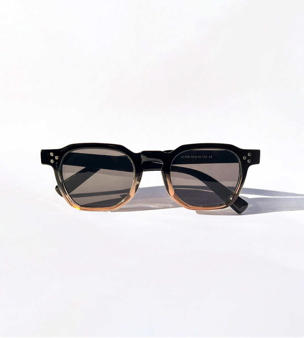 Black sunglasses with gold accents amalfi eyes sunglasses
